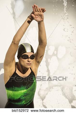 Caucasian swimmer diving into splashing water View Large Photo Image Stock Image - Caucasian swimmer diving into splashing water. Fotosearch