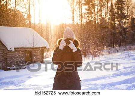 Caucasian woman photographing in snow View Large Photo Image Stock Photography - Caucasian woman photographing in snow. Fotosearch