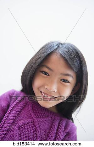 Close up of smiling face of Vietnamese girl View Large Photo Image Picture - Close up of smiling face of Vietnamese girl. Fotosearch