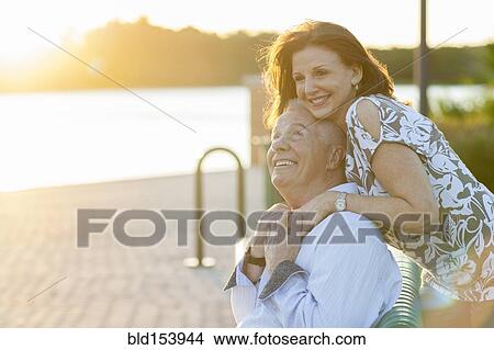Picture - Older Caucasian couple smiling outdoors. Fotosearch
