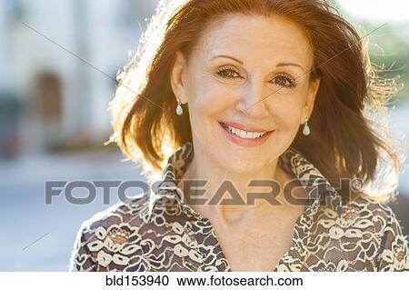 Stock Image - Older Caucasian woman smiling. Fotosearch