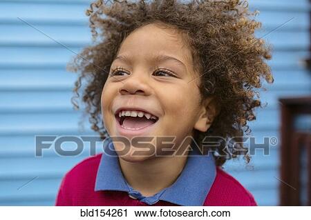 Pacific Islander boy laughing outdoors View Large Photo Image Stock Image - Pacific Islander boy laughing outdoors. Fotosearch