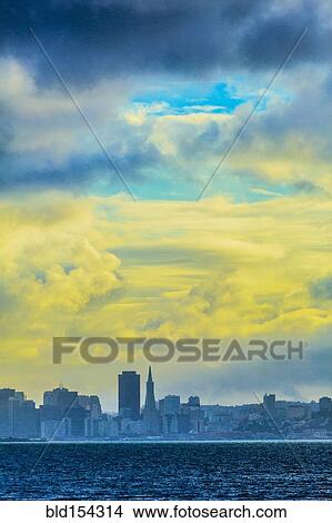 Picture - Silhouette of San Francisco city skyline under sunset sky. Fotosearch