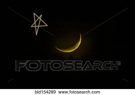 Star drawn by crescent moon in night sky View Large Photo Image Stock Photo - Star drawn by crescent moon in night sky. Fotosearch
