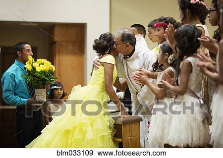 Hispanic community celebrating quinceanera in Catholic church View Large Photo Image Stock Photo - Hispanic community celebrating quinceanera in Catholic church. Fotosearch