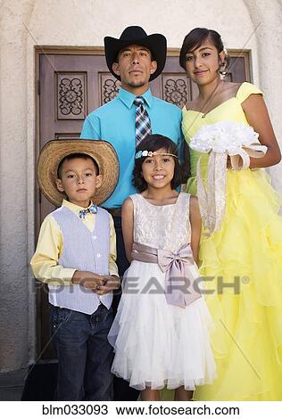 Hispanic family celebrating quinceanera outside Catholic church View Large Photo Image Stock Image - Hispanic family celebrating quinceanera outside Catholic church. Fotosearch