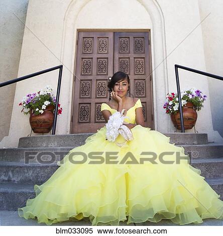 Hispanic girl celebrating quinceanera outside Catholic church View Large Photo Image Stock Photography - Hispanic girl celebrating quinceanera outside Catholic church. Fotosearch