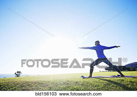 African American woman practicing yoga in park View Large Photo Image Stock Image - African American woman practicing yoga in park. Fotosearch