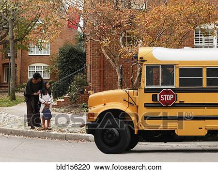 African American woman waiting with daughter for school bus View Large Photo Image Stock Image - African American woman waiting with daughter for school bus. Fotosearch