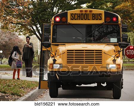 African American woman waiting with daughter for school bus View Large Photo Image Stock Image - African American woman waiting with daughter for school bus. Fotosearch