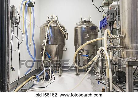 Beer brewing tanks in brewery View Large Photo Image Stock Image - Beer brewing tanks in brewery. Fotosearch