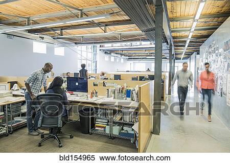 Blurred view of business people walking in office View Large Photo Image Stock Photography - Blurred view of business people walking in office. Fotosearch