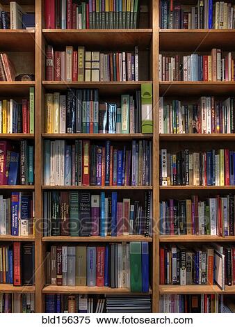 Stock Photography - Books organized in bookshelves. Fotosearch