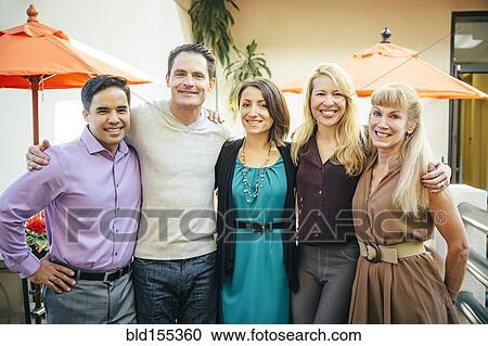 Business people smiling in cafe View Large Photo Image Stock Image - Business people smiling in cafe. Fotosearch