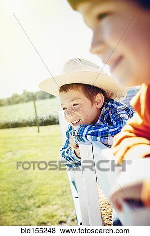 Caucasian children smiling on hay ride View Large Photo Image Stock Photo - Caucasian children smiling on hay ride. Fotosearch