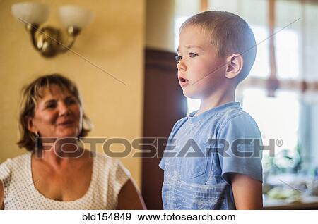 Stock Photo - Caucasian mother and son indoors. Fotosearch