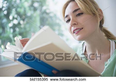 Caucasian woman reading book View Large Photo Image Stock Photography - Caucasian woman reading book. Fotosearch