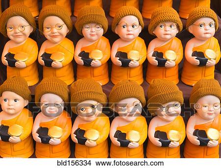 Picture - Close up of Buddhist monk dolls. Fotosearch