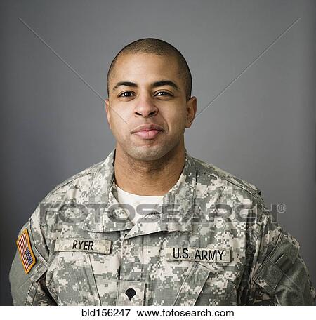 Close up of mixed race soldier smiling View Large Photo Image Stock Photo - Close up of mixed race soldier smiling. Fotosearch