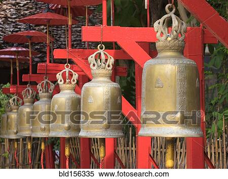 "Close up of ornate bells hanging outside temple, Chiang Mai, Chiang Mai, Thailand" View Large Photo Image Stock Photography - "Close up of ornate bells hanging outside temple, Chiang Mai, Chiang Mai, Thailand". Fotosearch