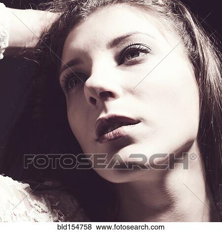 Close up of serious face of Caucasian woman View Large Photo Image Stock Photo - Close up of serious face of Caucasian woman. Fotosearch