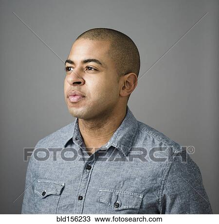 Close up of serious face of mixed race man View Large Photo Image Stock Image - Close up of serious face of mixed race man. Fotosearch