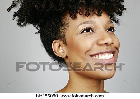 Close up of smiling face of mixed race woman View Large Photo Image Stock Image - Close up of smiling face of mixed race woman. Fotosearch