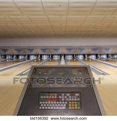 Computer facing empty lanes in bowling alley View Large Photo Image Stock Image - Computer facing empty lanes in bowling alley. Fotosearch