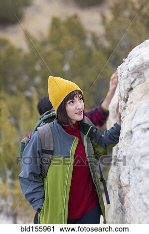 Stock Image - Couple admiring rock formations. Fotosearch