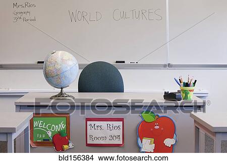 Picture - Empty desk of teacher in classroom. Fotosearch