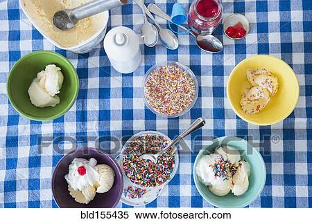 High angle view of ice cream sundaes View Large Photo Image Stock Photography - High angle view of ice cream sundaes. Fotosearch