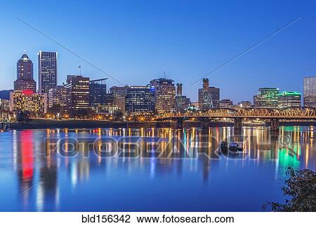 Stock Image - "Illuminated buildings in Portland city skyline, Oregon, United States". Fotosearch