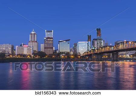 Stock Image - "Illuminated buildings in Portland city skyline, Oregon, United States". Fotosearch