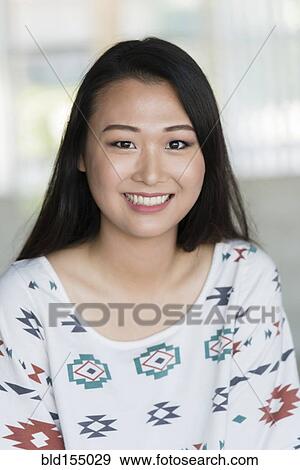Stock Photo - Korean woman smiling. Fotosearch