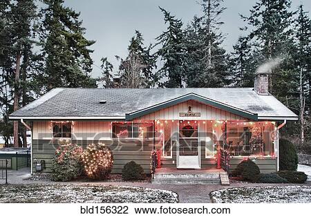 Snowy house with Christmas lights View Large Photo Image Stock Image - Snowy house with Christmas lights. Fotosearch