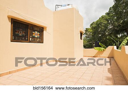 Picture - Window and walls over villa deck. Fotosearch
