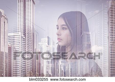 Stock Photography - Double exposure of mixed race girl over Palmerston North cityscape, Manawatu, New Zealand. Fotosearch