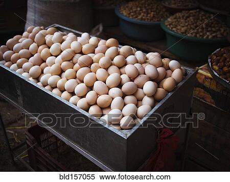 Bin of fresh eggs for sale in market View Large Photo Image Stock Photography - Bin of fresh eggs for sale in market. Fotosearch