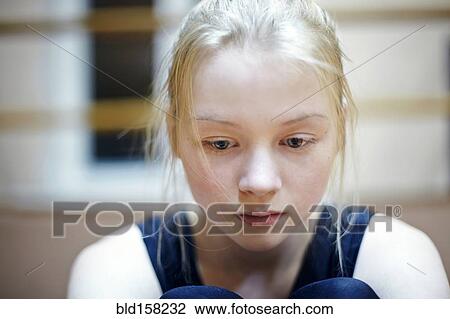 Caucasian girl looking down View Large Photo Image Stock Image - Caucasian girl looking down. Fotosearch
