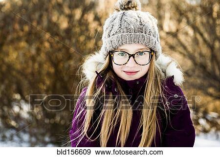 Caucasian girl smiling outdoors in winter View Large Photo Image Stock Photo - Caucasian girl smiling outdoors in winter. Fotosearch
