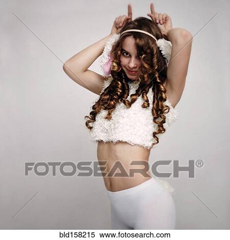 Stock Photography - Caucasian girl wearing rabbit costume. Fotosearch
