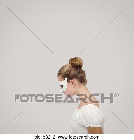 Caucasian girl wearing white mask View Large Photo Image Stock Image - Caucasian girl wearing white mask. Fotosearch