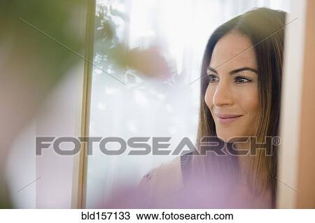Caucasian woman admiring herself in mirror View Large Photo Image Stock Image - Caucasian woman admiring herself in mirror. Fotosearch