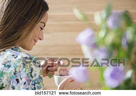 Caucasian woman drinking cup of tea View Large Photo Image Stock Image - Caucasian woman drinking cup of tea. Fotosearch