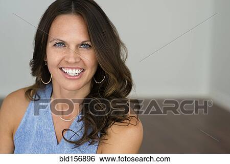 Stock Photograph - Caucasian woman smiling. Fotosearch