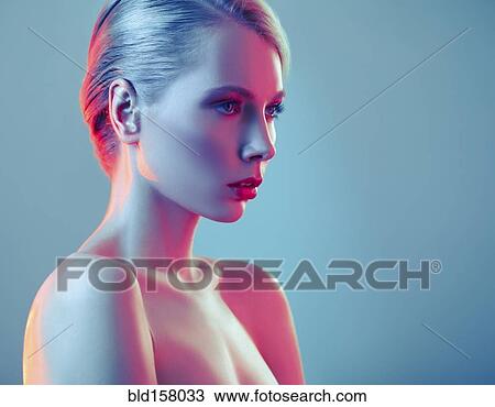 Stock Image - Caucasian woman with glamorous hairstyle. Fotosearch