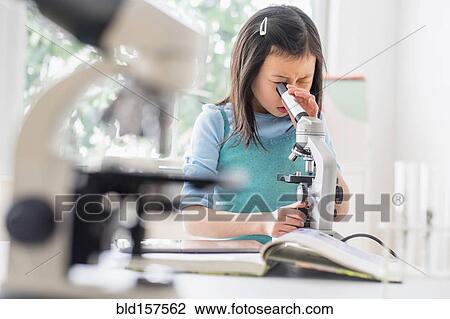 Chinese student using microscope in science lab View Large Photo Image Stock Image - Chinese student using microscope in science lab. Fotosearch