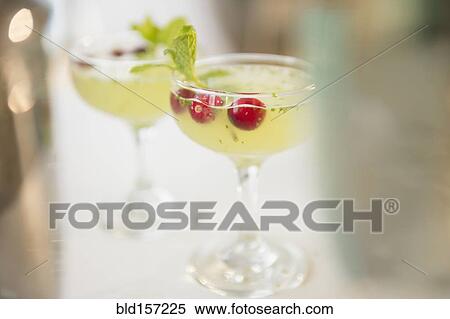 Close up of cocktails with garnish View Large Photo Image Stock Photography - Close up of cocktails with garnish. Fotosearch