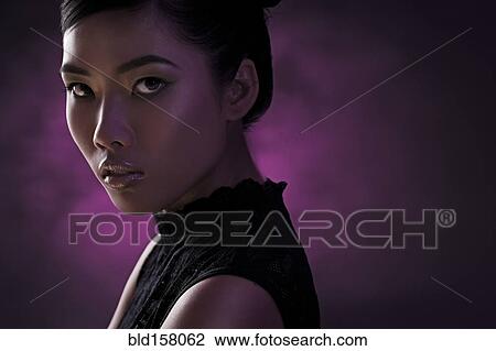 Stock Image - Close up of glamorous woman. Fotosearch