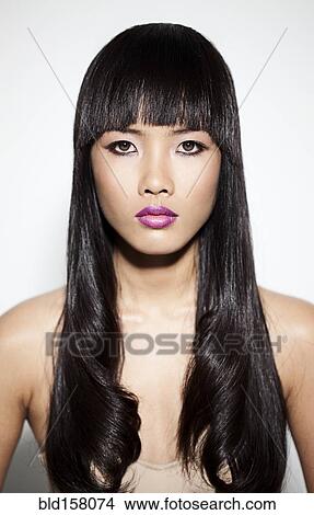 Picture - Close up of glamorous woman with long hair. Fotosearch